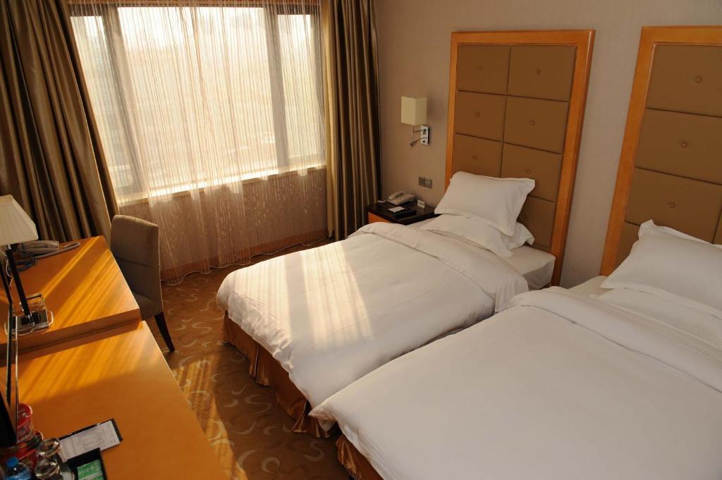 Shanghai Sky Rainbow Hotel Room photo